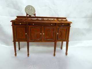 High end doll house carved buffet finished in walnut  