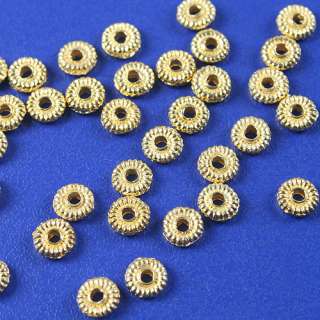 description 200pcs 5mm gold tone daisy spacer bead h3539