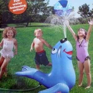    Fisher Price Toss N Spray Seal Sprinkler & Beach Ball Toys & Games
