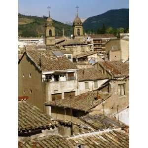  Old Buildings with Tiled Roofs and a Church Behind at Estella 