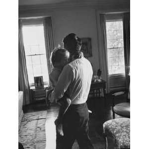  Attorney General Robert F. Kennedy Holding His Daughter 