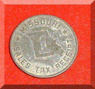 This is a vintage Missouri sales tax receipt token.
