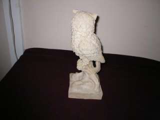  carved, alabaster, owl, figure. The owl is marked A Santani. The 