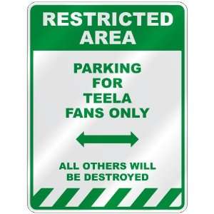   PARKING FOR TEELA FANS ONLY  PARKING SIGN