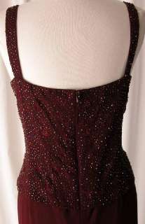 imagine yourself in this gorgeous evening gown the color is burgundy 