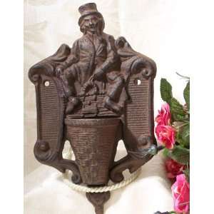 CAST IRON MATCH HOLDER * MAN WITH PIPE 