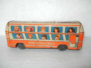   Friction Litho International Coach Bell System Bus Tin Toy  