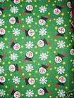 Christmas Fabric   Green background with Snowman Faces