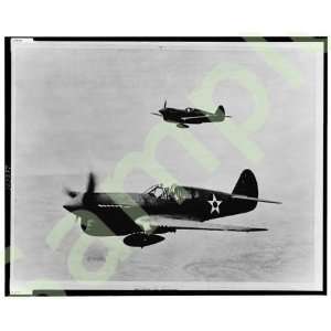  1943 Curtiss P 40 Warhawk SE fighter planes in flight 