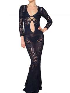 crochet knit. Deep V neckline; ornamental applique and peephole. Long 