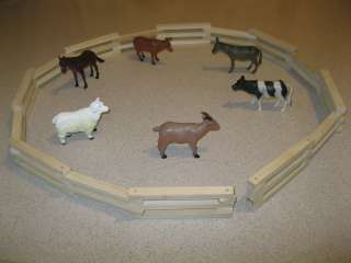 to 5 Farm Animals with wooden toy fence  