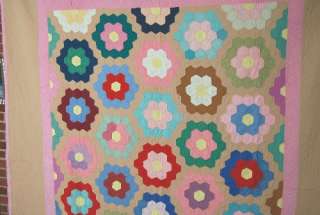 This GORGEOUS cotton 20s/30s Amish flower garden quilt is machine 