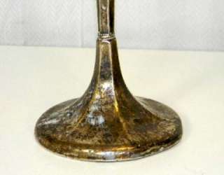 Pair Sterling silver candle stick marked sterling on the bottom. The 