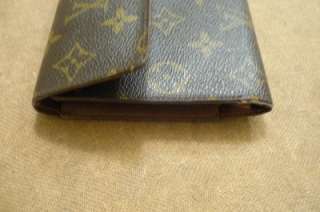 Authentic Louis Vuitton Vintage Wallet in fair condition its in need 