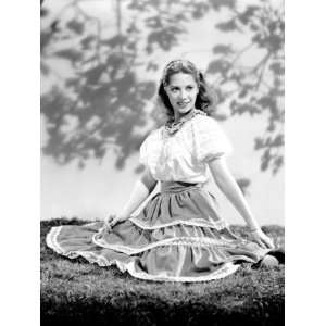 Dinah Shore Wearing Peasant Blouse and Skirt, c.1944 Premium Poster 