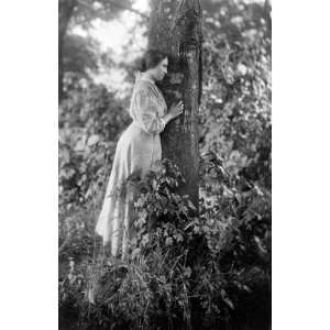 Helen Keller, full length portrait, standing by tree, 1907   16x20 