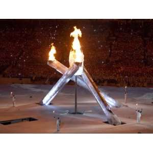 Standing with the Burning Olympic Cauldron at the Opening Ceremonies 