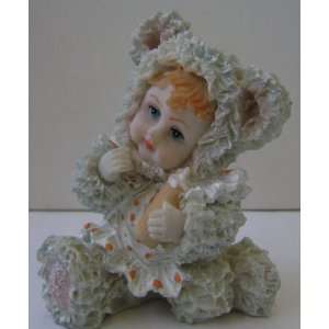  Ceramic Poly Baby in Teddy Bear Costume Figurine   3 1/2 
